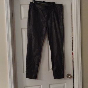 The skinny black and sparkle coated denim